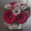 Bright pink gerbera daisies, white daisies, and light pink roses in a glass vase with ribbon—ideal for flower delivery in Clifton, Avondale, Walnut Hills, and nearby Cincinnati hospitals.