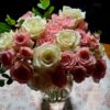Handcrafted bouquet of white and blush‑pink roses with lush foliage, arranged in a clear vase and delivered fresh by a Cincinnati florist.
