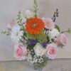 Local Cincinnati florist delivery bouquet with roses, daisies, gerbera blooms, and seasonal accents in a glass vase.