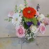 Local Cincinnati florist delivery bouquet with roses, daisies, gerbera blooms, and seasonal accents in a glass vase.