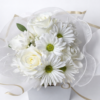 Celestial Ivory Charm Elegant white bouquet with roses, daisies, and greenery wrapped in gold‑trimmed paper and sheer ribbon