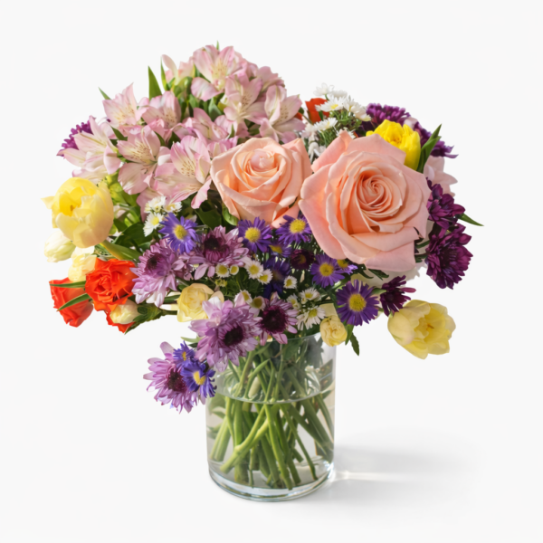Petal Mosaic Petal Mosaic bouquet with roses, tulips, chrysanthemums, daisies, and alstroemeria in a clear glass vase, fresh and vibrant.