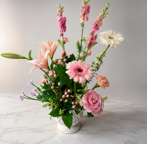 A Soft Life in Flowers A Soft Life in Flowers bouquet with roses, lilies, daisies, and carnations in a white vase, symbolizing freshness, secure delivery, and heartfelt storytelling across Cincinnati neighborhood.