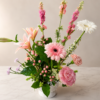A Soft Life in Flowers A Soft Life in Flowers bouquet with roses, lilies, daisies, and carnations in a white vase, symbolizing freshness, secure delivery, and heartfelt storytelling across Cincinnati neighborhood.