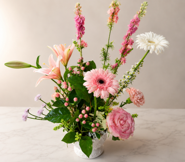 A Soft Life in Flowers A Soft Life in Flowers bouquet with roses, lilies, daisies, and carnations in a white vase, symbolizing freshness, secure delivery, and heartfelt storytelling across Cincinnati neighborhood.
