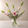 Growing and Glowin bouquet of lilies and seasonal blooms in a clear vase, symbolizing freshness and reliable flower delivery across Cincinnati and Northern Kentucky