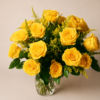 Bright Yellow Rose Bouquet In A Vase Bright yellow rose bouquet in a clear glass vase with greenery and solidago filler flowers.