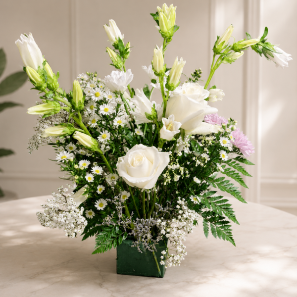 Handcrafted bouquet of premium roses and lilies by Local Cincinnati Florist at allthepeoplesflowers.com.