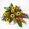 Casket Spray Sunflowers arrangement with radiant golden blooms, delivered fresh across Cincinnati and Northern Kentucky by allthepeoplesflowers.com
