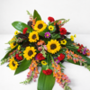 Casket Spray Sunflowers arrangement with radiant golden blooms, delivered fresh across Cincinnati and Northern Kentucky by allthepeoplesflowers.com