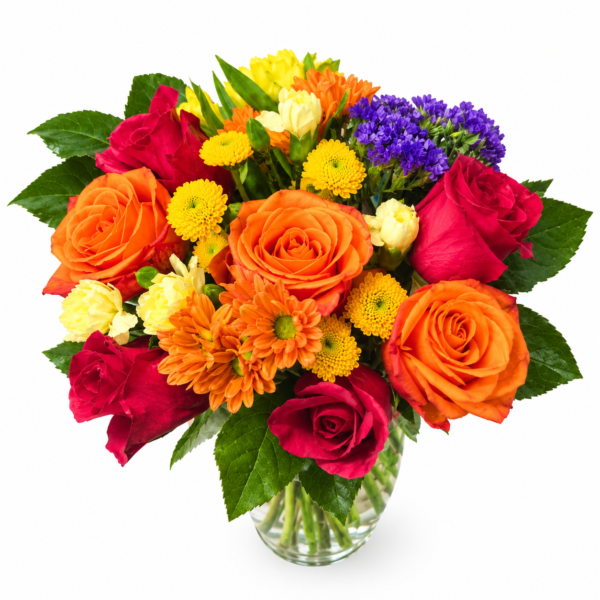 Rainbow Vase bouquet with orange roses, red roses, yellow daisies, purple accents, and lush greenery in a clear glass vase.