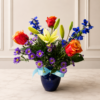 Cincinnati Twilight Vase with roses, lilies, and purple blooms, handcrafted by allthepeoplesflowers.com for delivery in Cincinnati and Northern Kentucky