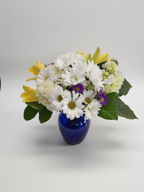 Elegant handcrafted flower arrangement featuring fresh roses, seasonal blooms, and lush greenery, expertly designed by All The People's Flowers for delivery in Cincinnati and Northern Kentucky.