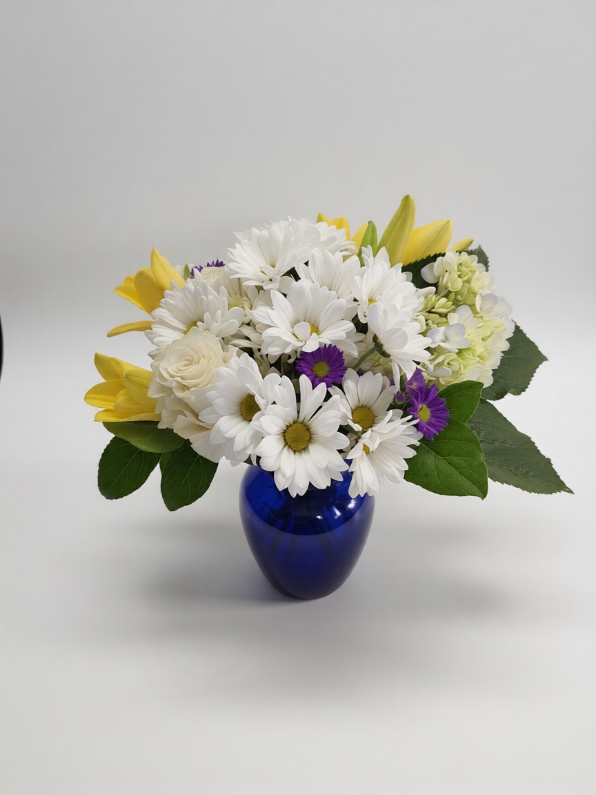 Elegant handcrafted flower arrangement featuring fresh roses, seasonal blooms, and lush greenery, expertly designed by All The People's Flowers for delivery in Cincinnati and Northern Kentucky.