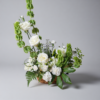 Heaven’s Light Cross floral arrangement with white roses, carnations, greenery, and a crystal cross, delivered fresh across Cincinnati and Northern Kentucky by allthepeoplesflowers.com