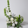 Heaven’s Light Cross floral arrangement with white roses, carnations, greenery, and a crystal cross, delivered fresh across Cincinnati and Northern Kentucky by allthepeoplesflowers.com