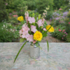 My girl Handcrafted floral arrangement featuring bright yellow roses and soft pink alstroemeria in a silver ribbed vase, symbolizing love, joy, and gratitude — available for flower delivery in Cincinnati, Ohio, and Northern Kentucky.