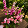 Crazy Beautiful bouquet of pink roses and magenta larkspur with lush greenery, handcrafted for freshness and reliable Cincinnati flower delivery.