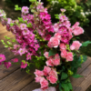 Crazy Beautiful bouquet of pink roses and magenta larkspur with lush greenery, handcrafted for freshness and reliable Cincinnati flower delivery.