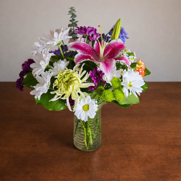 Tropicana bouquet featuring fresh, premium-quality flowers in vibrant tropical hues, handcrafted by local Cincinnati florists and delivered across Cincinnati and Northern Kentucky.