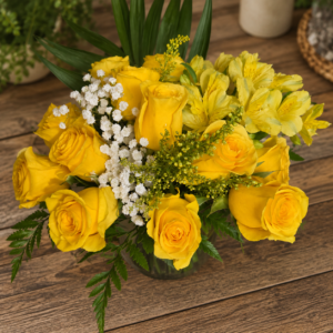 Bright yellow rose and alstroemeria bouquet in clear glass vase, handcrafted by All the People’s Flowers, local Cincinnati florist.