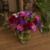 Elegant white floral bouquet with lush greenery, handcrafted by All the People’s Flowers, local Cincinnati florist.