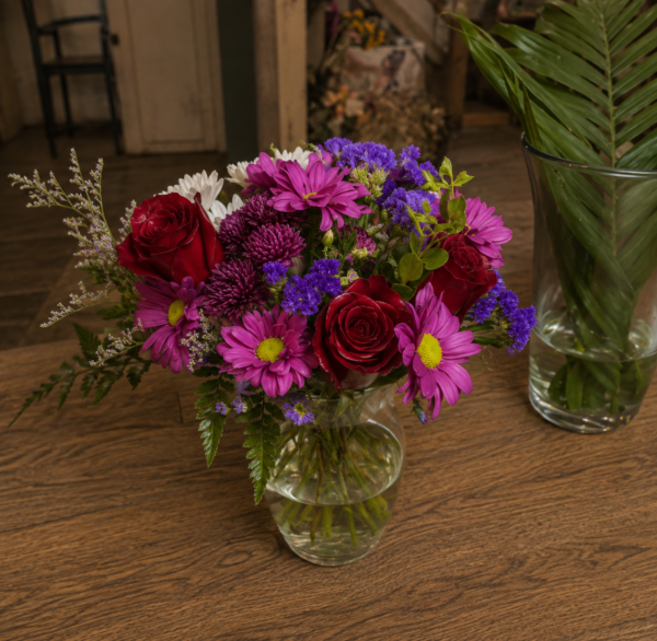 Elegant white floral bouquet with lush greenery, handcrafted by All the People’s Flowers, local Cincinnati florist.