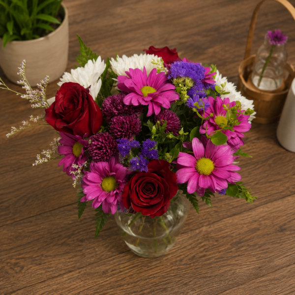 Elegant white floral bouquet with lush greenery, handcrafted by All the People’s Flowers, local Cincinnati florist.