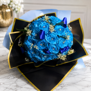 Hollywood Blues bouquet of radiant blue roses with sparkling gems, wrapped in black and gold paper, handcrafted by Cincinnati florist.