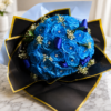 Hollywood Blues bouquet of radiant blue roses with sparkling gems, wrapped in black and gold paper, handcrafted by Cincinnati florist.