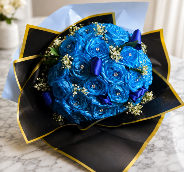 Hollywood Blues bouquet of radiant blue roses with sparkling gems, wrapped in black and gold paper, handcrafted by Cincinnati florist.