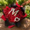 Customized bouquet of 50 red roses with gypsophila embroidery, handcrafted by All the People’s Flowers, local Cincinnati florist.