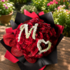 Customized bouquet of 50 red roses with gypsophila embroidery, handcrafted by All the People’s Flowers, local Cincinnati florist.