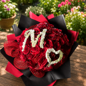 Customized bouquet of 50 red roses with gypsophila embroidery, handcrafted by All the People’s Flowers, local Cincinnati florist.