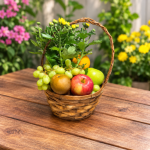 Wicker basket filled with fresh apples, pears, oranges, grapes, and seasonal flowers arranged for a get well gift.