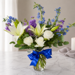 “Our Prayers Are With You Sympathy bouquet with white lilies, roses, and seasonal blooms, handcrafted by local Cincinnati florist allthepeoplesflowers.com.”