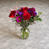 She’s Royal (Eucalyptus Edition) bouquet featuring roses, chrysanthemums, magenta daisies, and eucalyptus in a handcrafted arrangement from allthepeoplesflowers.com.