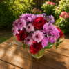 “She’s Royal Lavender Edition bouquet with red roses, purple chrysanthemums, and lush greenery, handcrafted by local Cincinnati florist allthepeoplesflowers.com.”