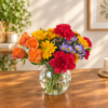 Fall Mini Vase with orange roses, yellow daisies, pink carnations, and purple asters, handcrafted by local Cincinnati florist.